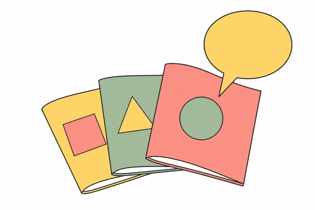 Three open booklets fanned out with a speech bubble rising from the top one